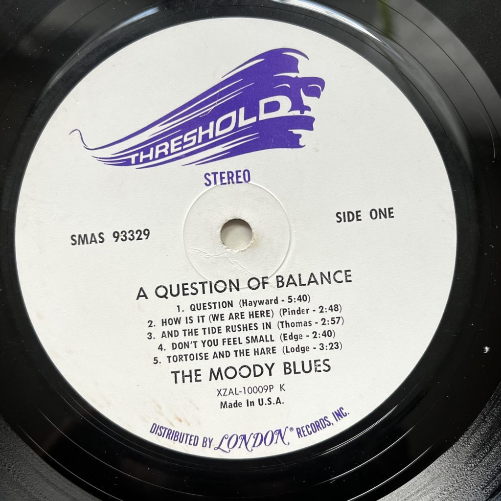 A Question of Balance label on Threshold