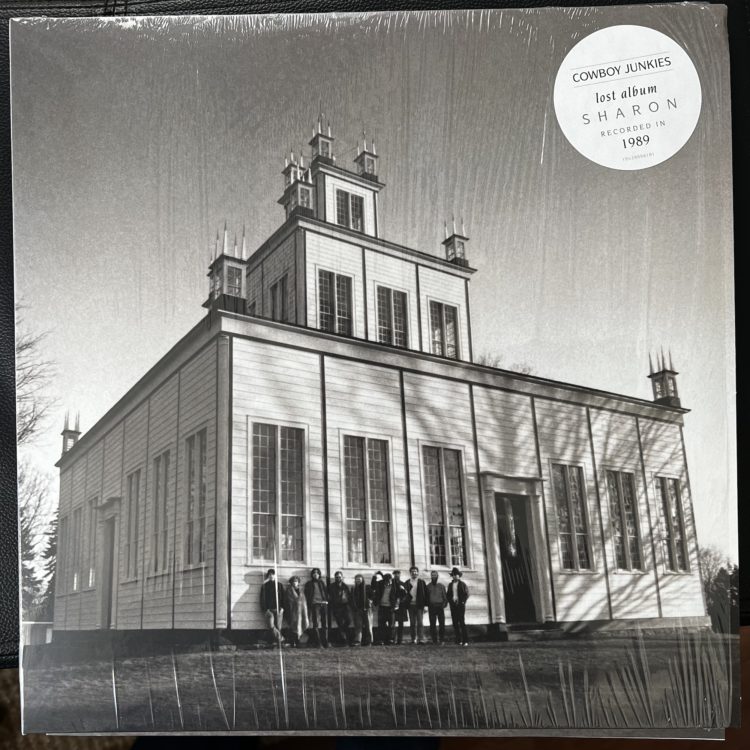 Cowboy Junkies – Sharon front cover. A familiar building to those who studied The Caution Horses, this is the unheated former church where they recorded this beauty.