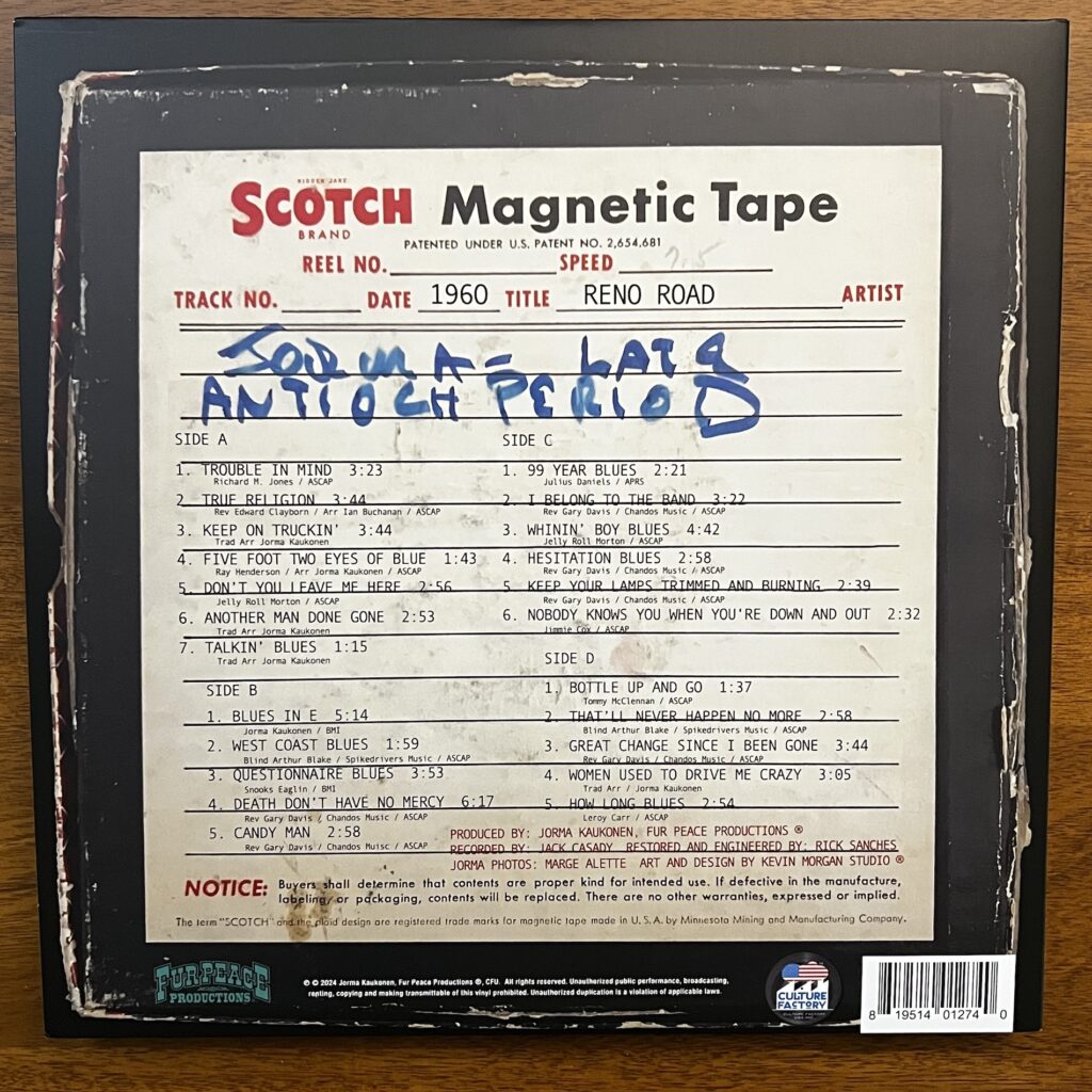 Back cover of Reno Road – art depicting an old Scotch Magnetic Tape box label, with the album title and track listing set in type atop the label