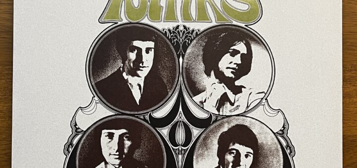 Something Else by the Kinks front cover – the type is in a drawn, fantasy-style font above four circular photographs, in high-contrast black and white, of the four members of the band. The circles are linked by art nouveau decorative elements.